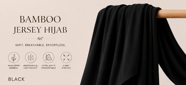 Black bamboo jersey hijab on a wooden rod with product features listed.