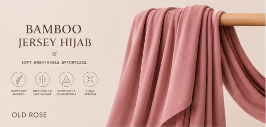 Old Rose bamboo jersey hijab on a wooden rod with product features listed.