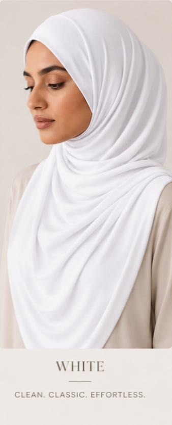 Woman wearing a white luxe Jersey hijab with text describing the color as 'clean, classic, effortless'.