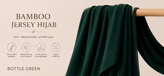Bottle green bamboo jersey hijab on a beige background with text highlighting features.