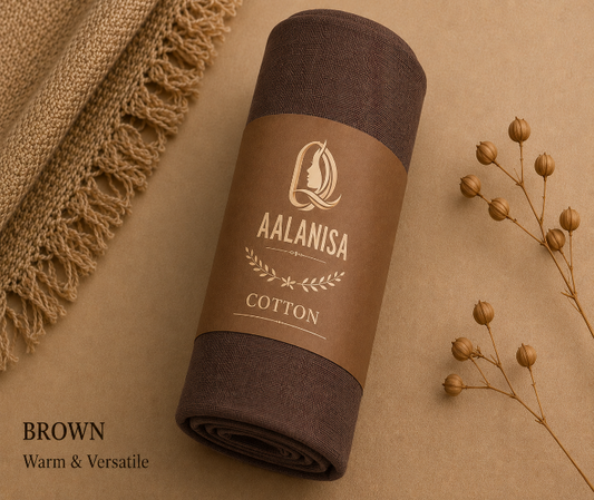 Brown rolled-up Premium Modal Cotton Hijab with Aalanisa branding on a beige background