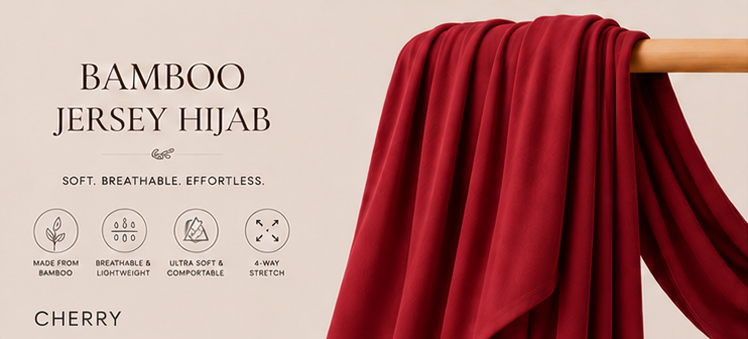 Cherry Red bamboo jersey hijab on a wooden stick with product features listed.