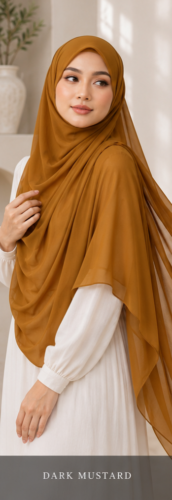 Woman wearing a dark mustard premium Malaysian Georgette hijab in a neutral setting