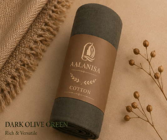 Roll of AAlanisa Dark Olive Premium Modal Cotton Hijab with a label on a beige background