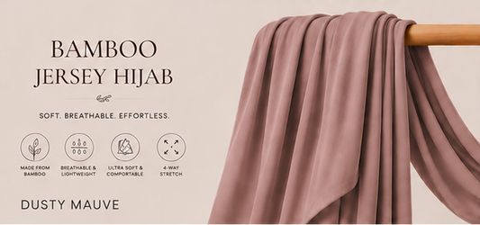 Bamboo jersey hijab in dusty mauve color on a wooden rod with product features listed.