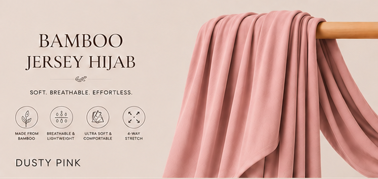 Dusty pink bamboo jersey hijab on a wooden rod with product features listed.