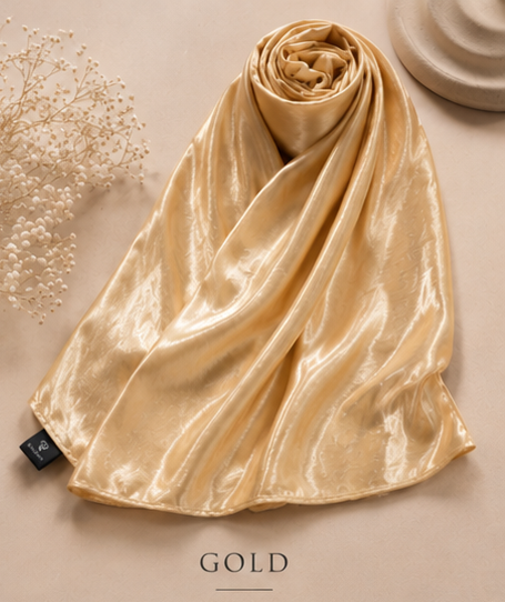 Gold Bubble satin Islamic Hijab scarf on a beige surface with 'GOLD' text