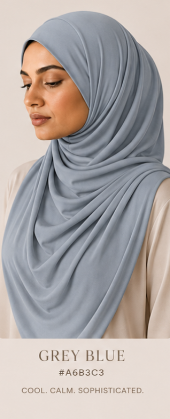 Woman wearing a light grey blue luxe jersey hijab with color code and description text overlay.