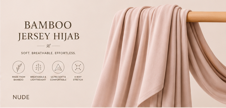 Nude bamboo jersey hijab on a wooden rod with product features listed.