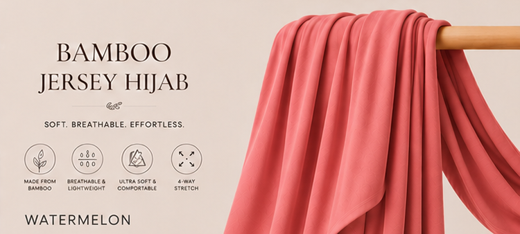 Bamboo jersey hijab in watermelon color on a wooden rod with product features listed.